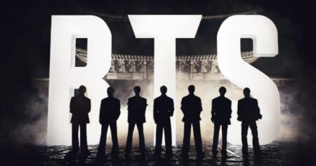 Integrantes do BTS em silhueta diante do nome do grupo durante cena do trailer do documentário da Netflix